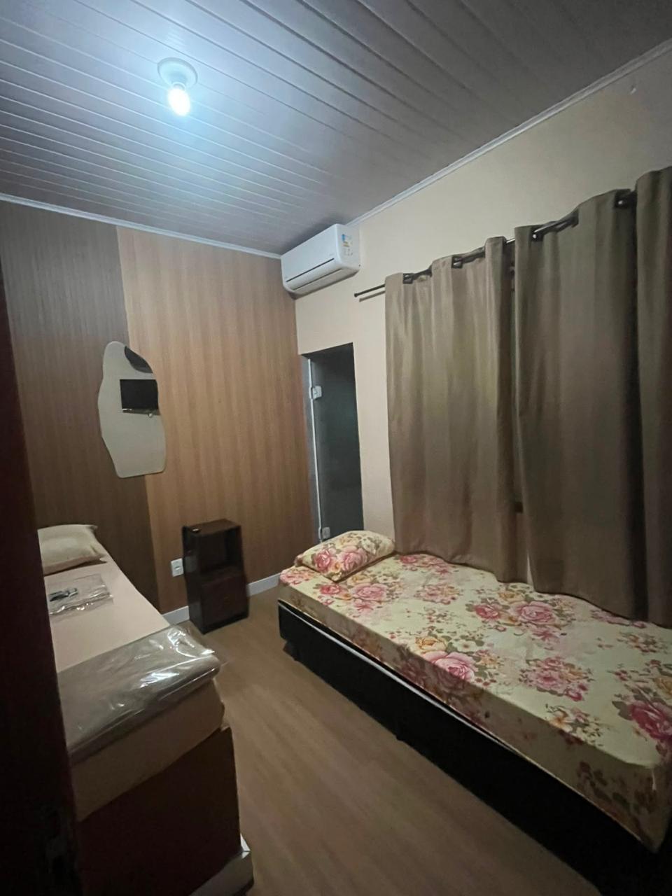 Cama da suíte com ar-condicionado